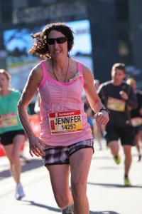Jennifer racing the Soctiabank Waterfront Half Marathon in Oct 2013 - in 1 hour 36 minutes!